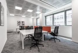 Book a reserved coworking spot or hot desk in Regus Mumtaz city.