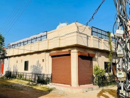 10 Marla corner house for sale with running shop  Qureshi Town Nilore